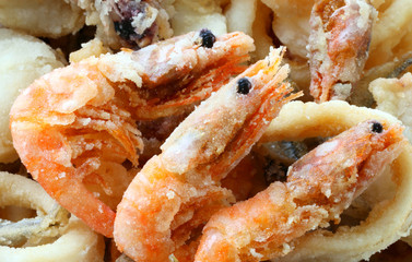 three fried shrimp in the takeaway restaurant