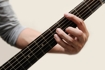 Guitar chords,Selective focus,Guitarist,The musicians are catching the guitar chords is C minor...