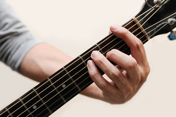 Guitar chords,Selective focus,Guitarist,The musicians are catching the guitar chords is F chord full bar on white background