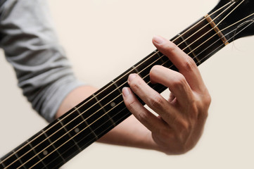 Fototapeta premium Guitar chords,Selective focus,Guitarist,The musicians are catching the guitar chords is F sharp chord full bar on white background