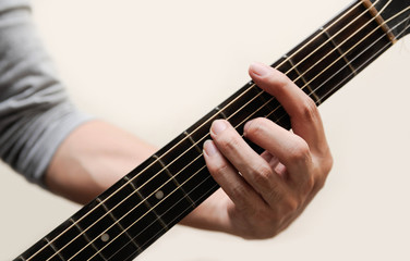 Fototapeta premium Guitar chords,Selective focus,Guitarist,The musicians are catching the guitar chords is G chord on white background