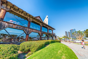 SAN DIEGO - JULY 30, 2017: San Diego skyline and buildings along sea promenade. The city attracts 10 million tourists annually