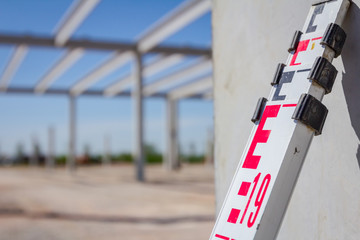 Top of leveling rod for measuring level on construction site