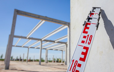 Top of leveling rod for measuring level on construction site