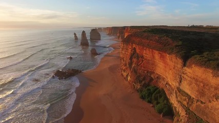 Arrial view of Twelve Apostles Rocks at sunset from helicopter, Great Ocean Road