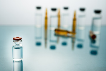 Medical Vaccine vial hypodermic injection treatment disease care in hospital and prevention illness.