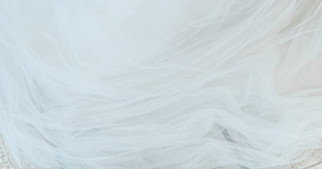 White light fabric develops against the blue sky. outdoor restaurant decoration