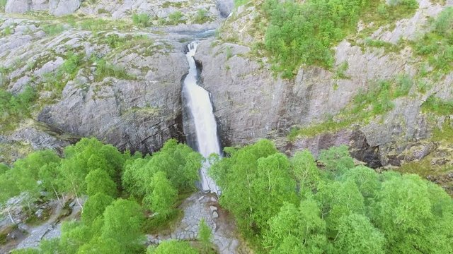 Video of Manafossen waterfall in Norway. Aerial shot. Top view.
