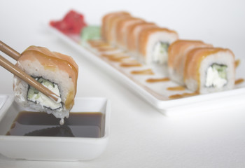 sushi rolls and sauce