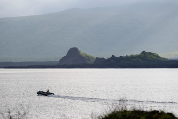 Fototapeta premium Boat heading out to see in the Galapagos