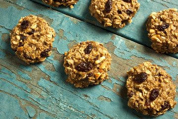 Home made cereal cookies on a blue wooden background - obrazy, fototapety, plakaty