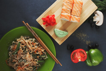 place for text noodles vegetables sushi rolls