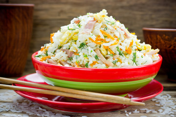 Tyahan japanise pilaf with rice, ham and vegetables