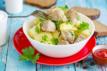 Pork potato stew goulash in bowl