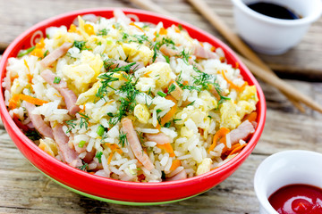 Tyahan japanise pilaf with rice, ham and vegetables