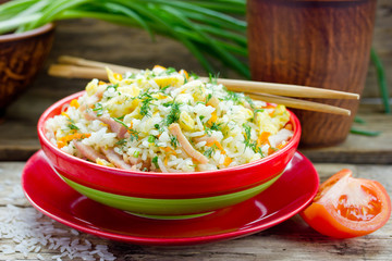 Tyahan japanise pilaf with rice, ham and vegetables