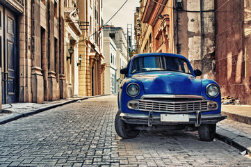 HAVANA, CUBA- JAN 20, 2017: Old american car parked in a street of Old Havana