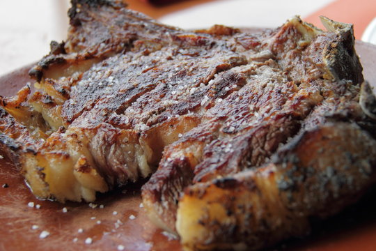 Tradition grilled chuleton on bone with salt