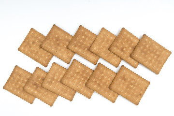 Some dry biscuits on a white surface