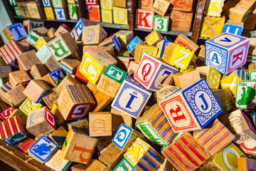 Pile of colorful children’s alphabet wooden block toys