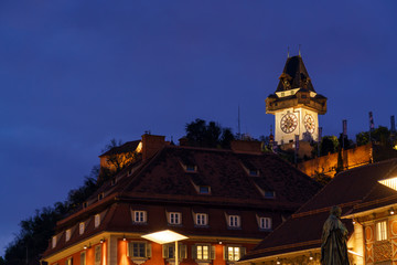 The Schlossberg or Castle Hill with the tower Uhrturm at night, Graz, Austria