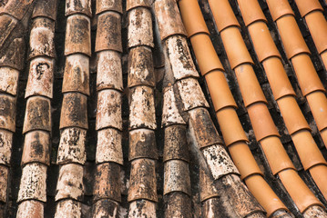 Old roof tile.Exterior background.Traditional europe terracotta tile.