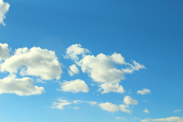Beautiful natural blue sky and white fluffy clouds. Background. Landscape.