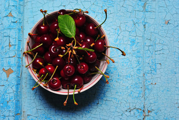 red cherry on a blue background