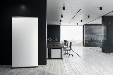 Coworking office with empty ad stand