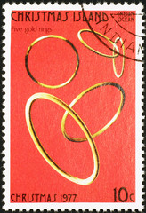Twelve days of Christmas - 5 gold rings on postage stamp of Christmas Island