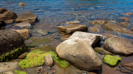 Obraz na płótnie Canvas Stones on the sea shore