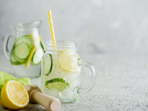 Fresh Summer Drink. Healthy detox fizzy water with lemon and cucumber in mason jar. Healthy food concept.