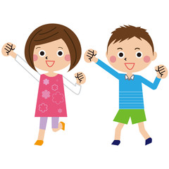 男の子と女の子がガッツポーズ