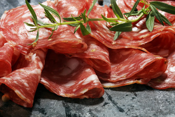 thinly sliced salami . delicious snack rustic salami