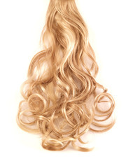 Naklejka premium Blonde hair with curls on white from overhead