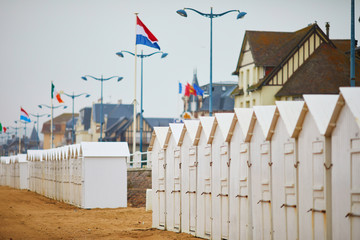 Cabanas on beach of Villers-sur-Mer in Lower Normandy, France