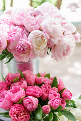 Lovely flowers in glass vase. Beautiful bouquet of pink peonies . Floral composition, scene, daylight. Wallpaper
