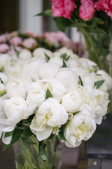 Lovely flowers in glass vase. Beautiful bouquet of white peonies . Floral composition, scene, daylight. Wallpaper