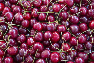 Fresh ripe cherries background, top view. Flat lay. Close-up.