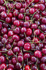 Fresh ripe cherries background, top view. Flat lay.