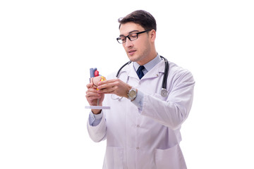 Young doctor with heart shape isolated on white