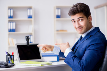Young help desk operator working in office