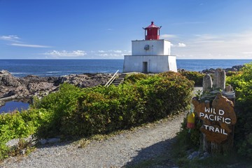 Fototapeta na wymiar Amphitrite Point Lighthouse on Wild Pacific Hiking Trail near Ucluelet, Vancouver Island British Columbia Canada