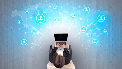 Social media concept with woman sitting on chair with tablet on her hand

