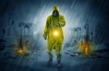 Fototapeta premium Destroyed place after a catastrophe with man in raincoat and lantern concept 