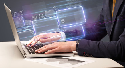 Hand typing on laptop with online accounting system concept
