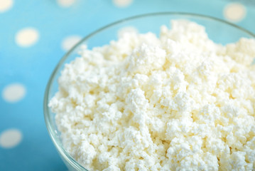 Cottage cheese on blue background.