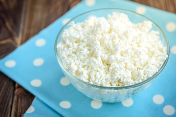 Cottage cheese on blue background.