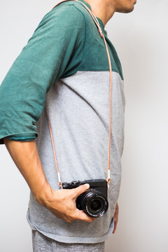 Hipster men with leather camera strap on white background