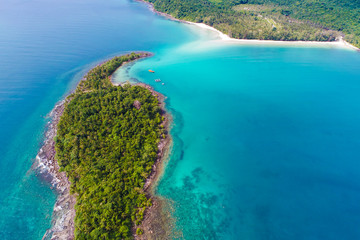 Fototapeta na wymiar Rocky island sea beach with green tree aerial view
